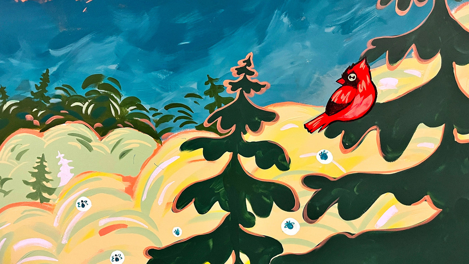 Cardinal bird perched on a tree in a stylized forest landscape with colorful trees and a blue sky. Mural.