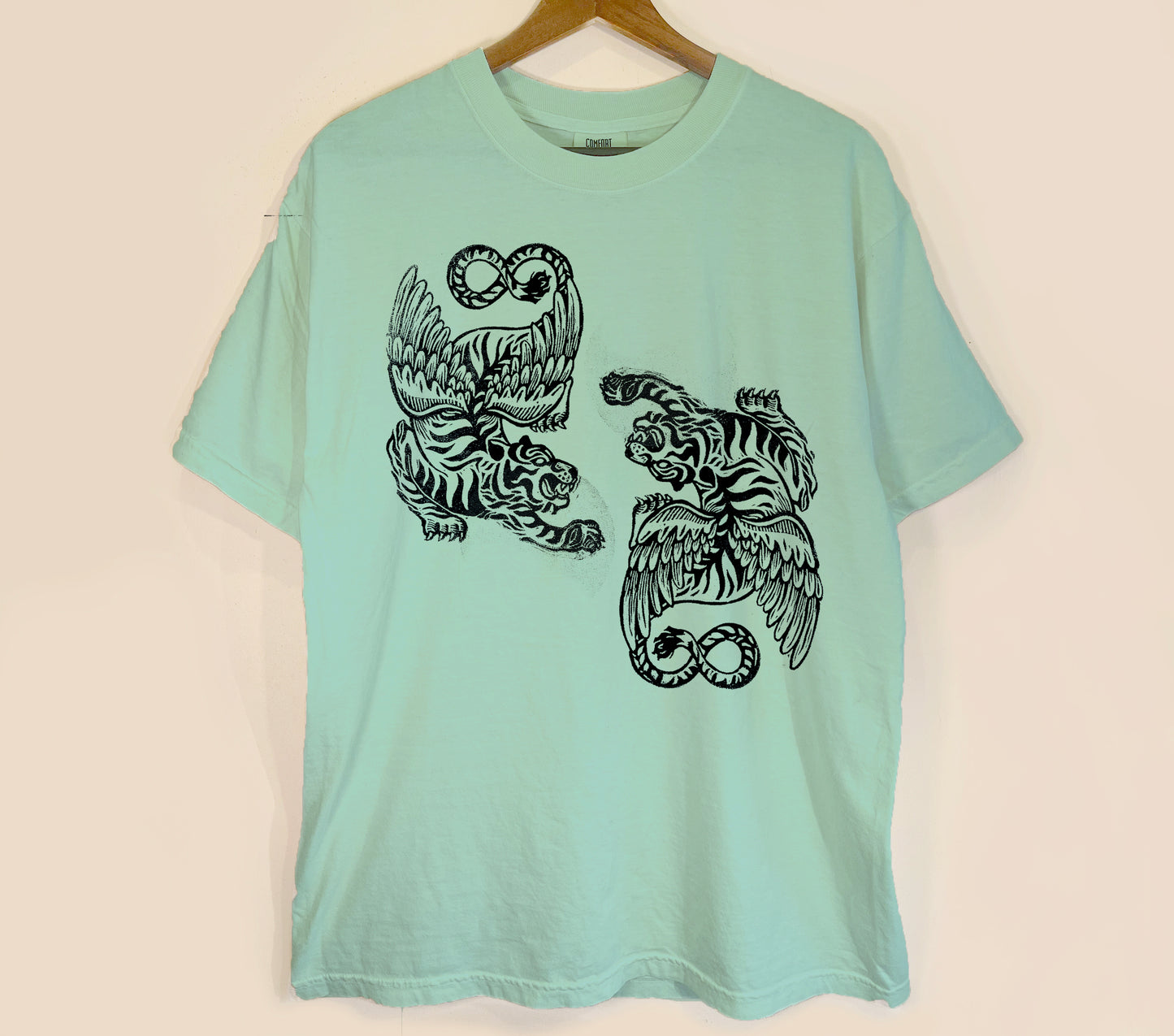 Flying Tigers linocut tshirt design, hand printed by erika busse asheville artist on a comfort colors bay tshirt