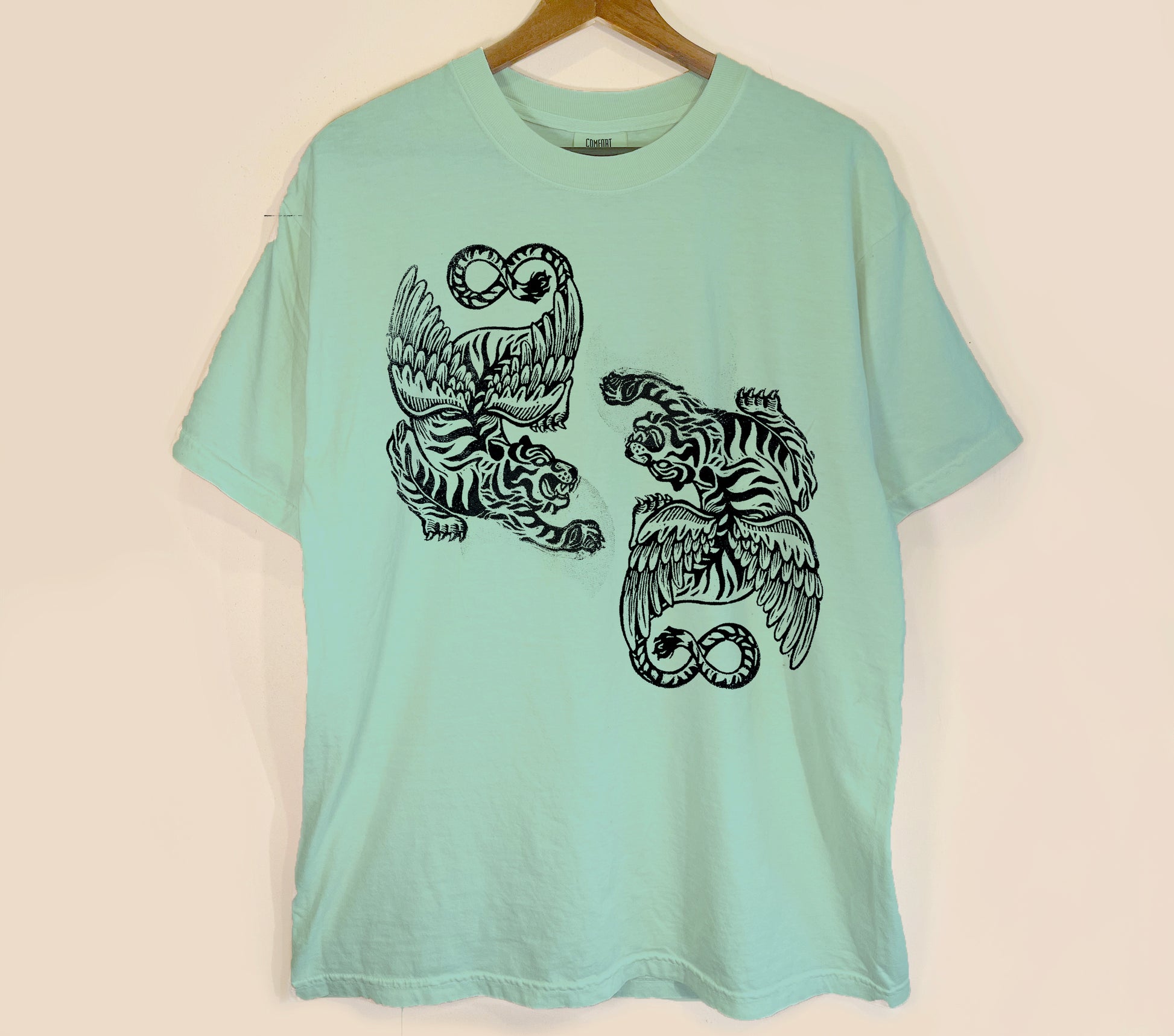 Flying Tigers linocut tshirt design, hand printed by erika busse asheville artist on a comfort colors bay tshirt
