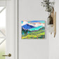 Painting of a mountain landscape with green fields and blue sky by asheville artist erika busse