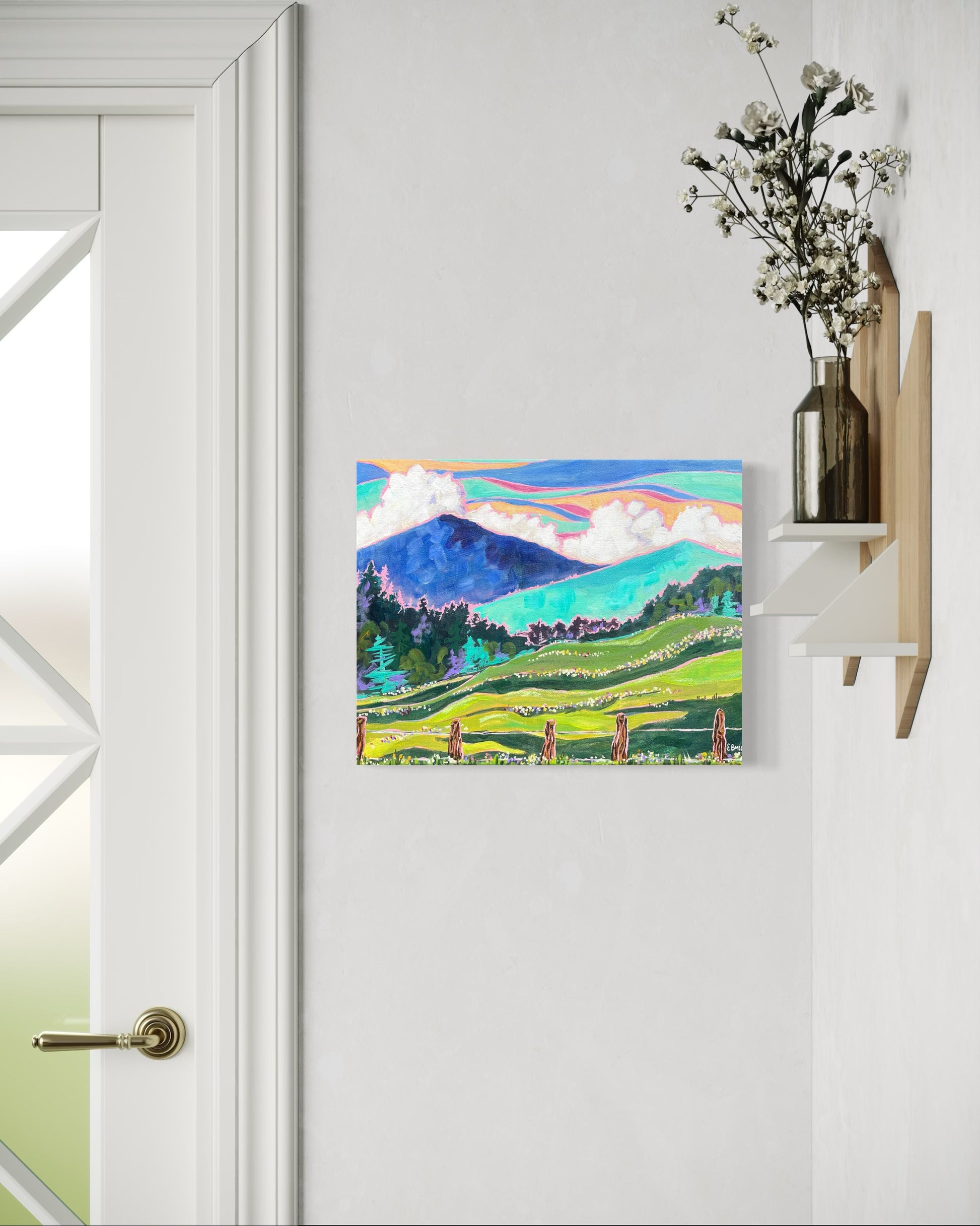 Painting of a mountain landscape with green fields and blue sky by asheville artist erika busse