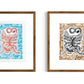Two framed artworks of tigers with abstract patterns on a white background
